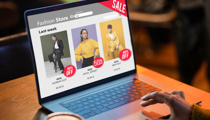 close shot of person browsing online fashion store
