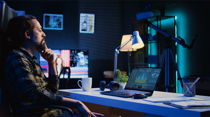 financial advisor analyzing statistical graphs