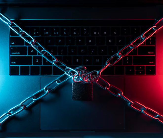 laptop padlocked with chain