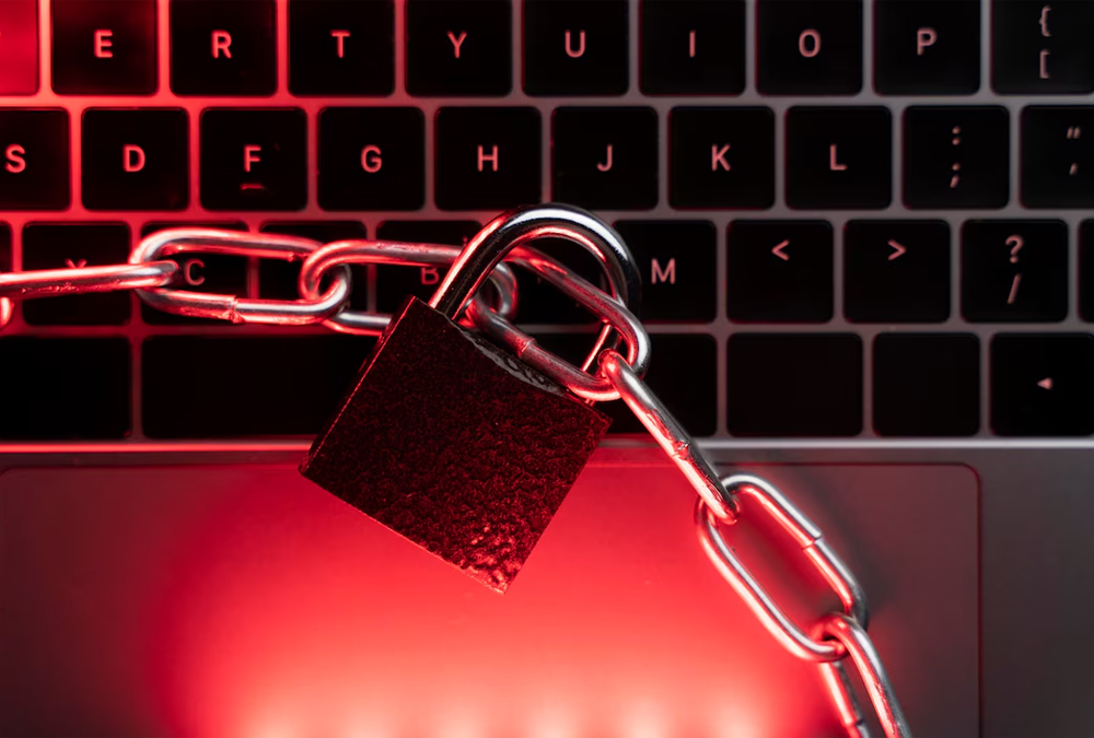 padlock with chain on laptop touchpad