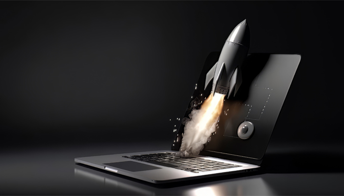 rocket taking off a grey laptop